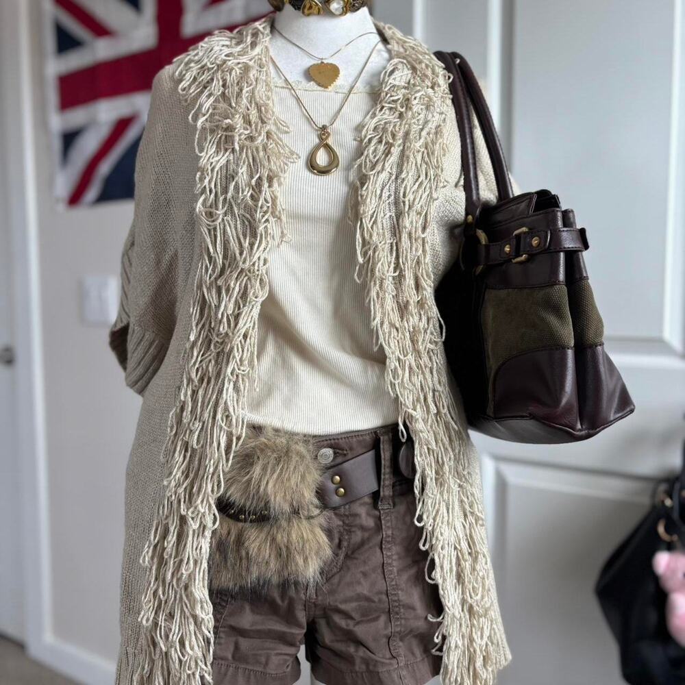 Cream short sleeve frillyfringe cardigan